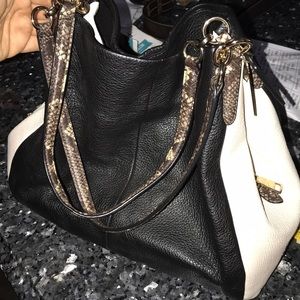 Coach black and white snake skin shoulder bag.